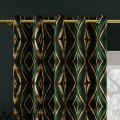 Materiał zielony w geometryczne żółte wzory.jpeg